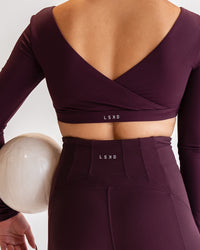 Woman wearing Aria Long Sleeve Sports Bra - Cherry Lacquer | Model:Sarah | Size:S | Thumbnail Index: 1