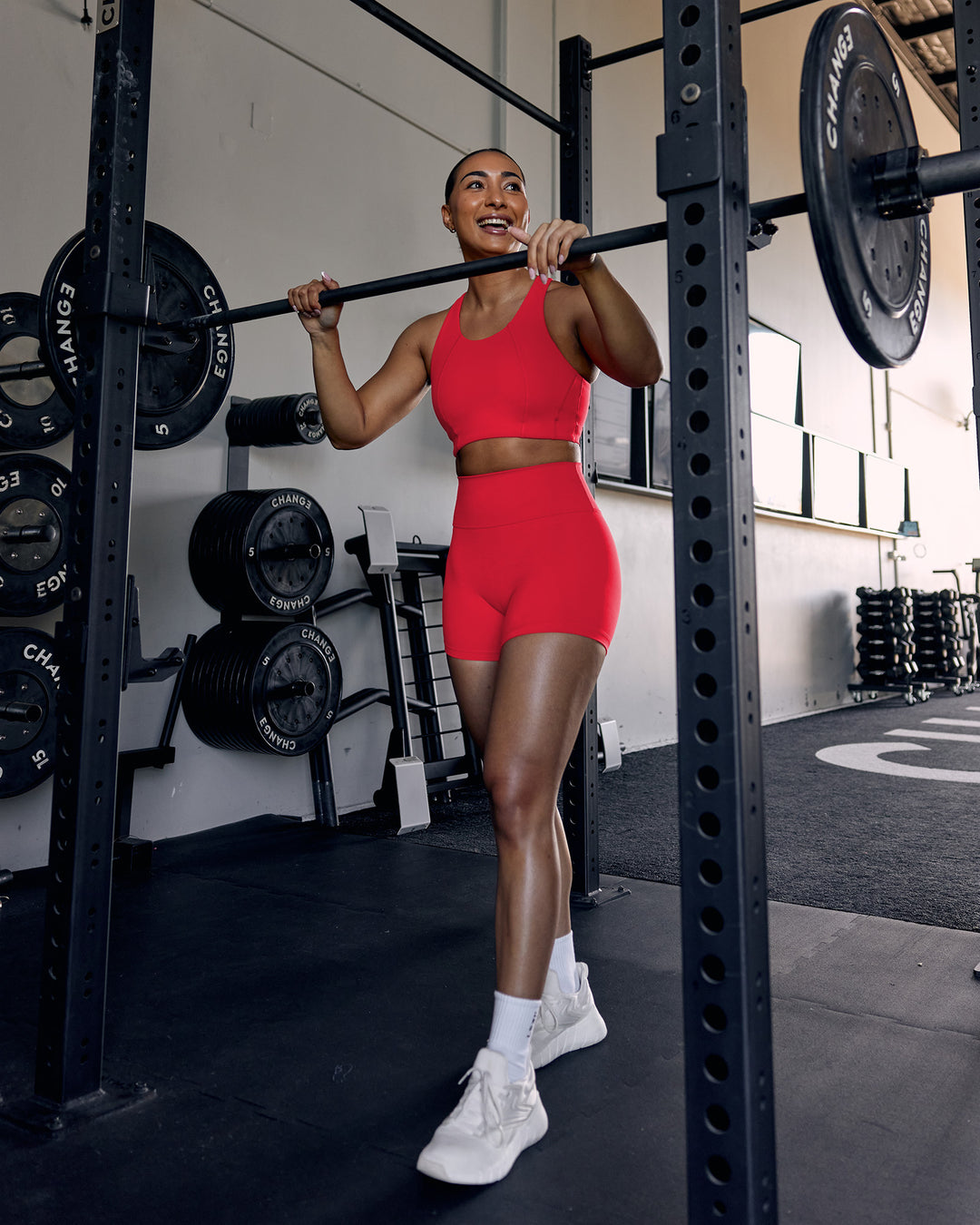 Woman wearing Ascent Sports Bra - Scarlet | Model:Keisha | Size:S - view 4