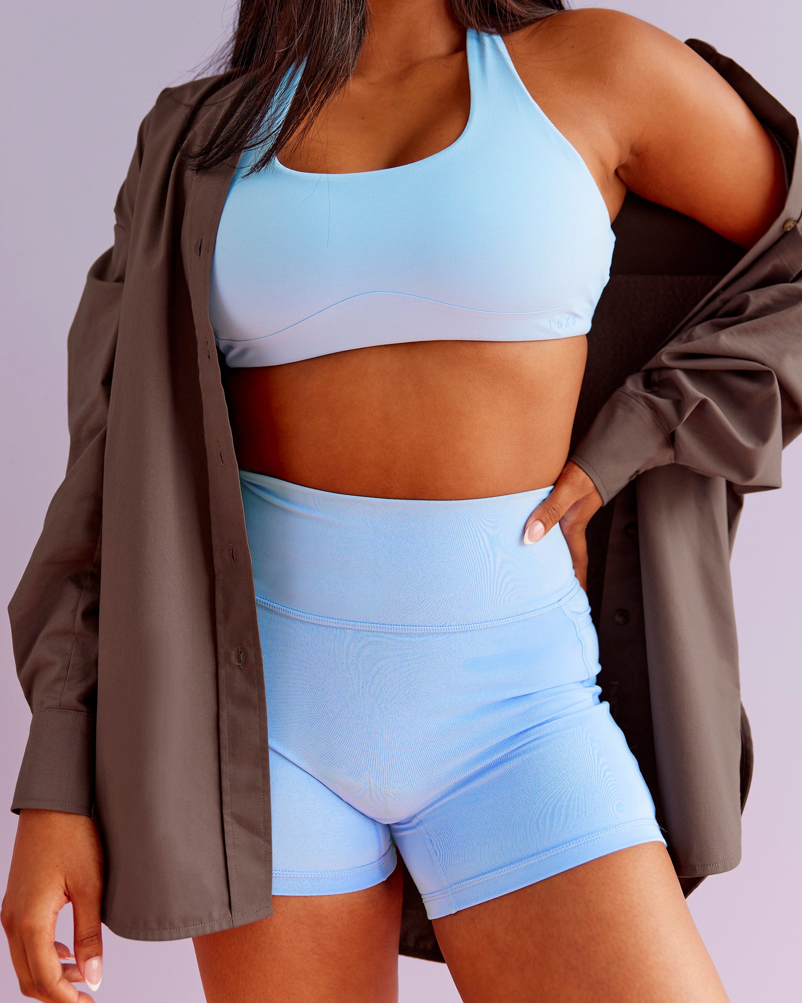 Woman wearing Aspire Sports Bra - Open Air | Model:Nikki | Size:S