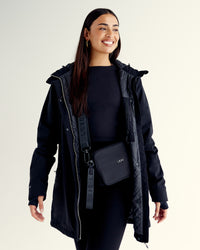 Woman wearing Auxiliary 2.0 Jacket - Black | Model:Ruby | Size:S | Thumbnail Index: 4