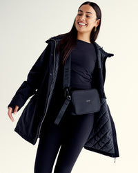 Woman wearing Auxiliary 2.0 Jacket - Black | Model:Ruby | Size:S | Thumbnail Index: 0