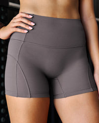 Woman wearing Bend High-Rise 4" Short - Duskstone | Model:Stella | Size:S | Thumbnail Index: 4