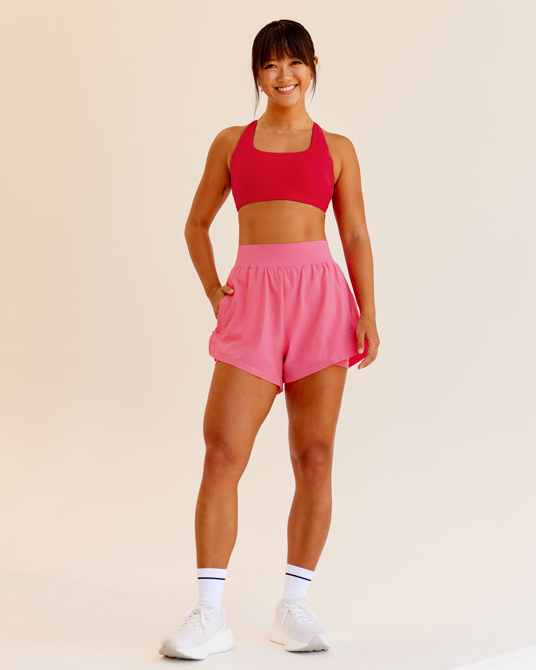 Woman wearing Challenger 3" Lined Performance Shorts in Pink Lemonade | Size:S - view 3