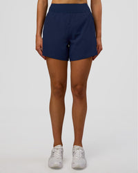Woman wearing Challenger 5" Lined Performance Short - Future Navy | Model: Evie | Size:S | Thumbnail Index: 2