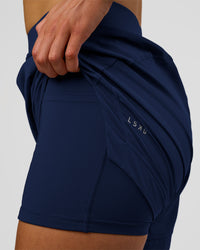 Woman wearing Challenger 5" Lined Performance Short - Future Navy | Model: Evie | Size:S | Thumbnail Index: 1