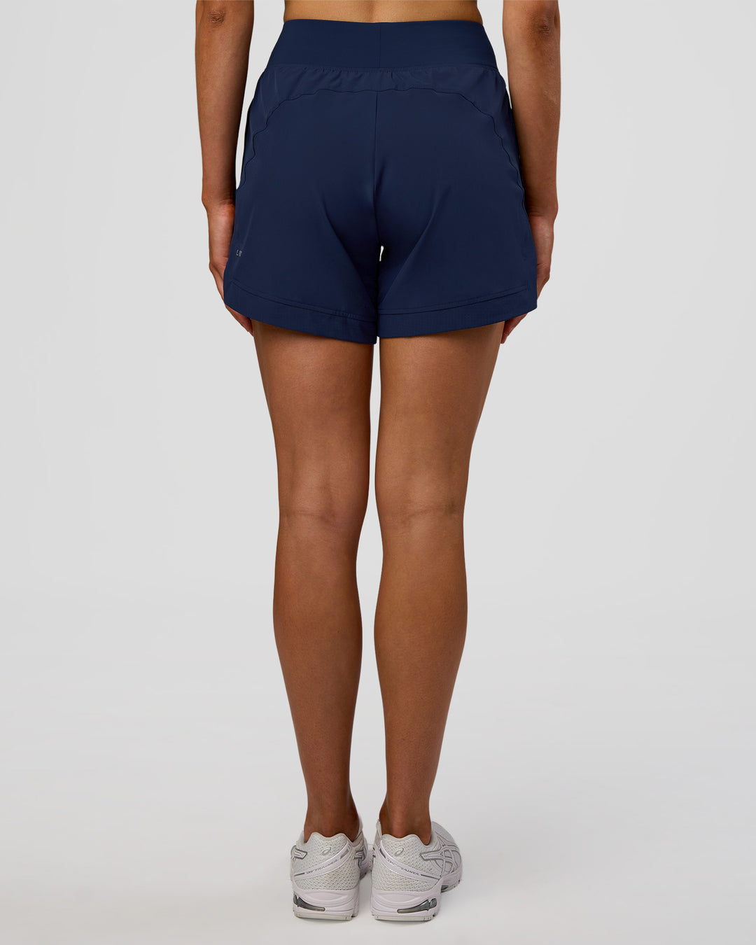 Woman wearing Challenger 5" Lined Performance Short - Future Navy | Model: Evie | Size:S - view 4