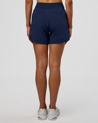 Woman wearing Challenger 5" Lined Performance Short - Future Navy | Model: Evie | Size:S | Thumbnail Index: 3