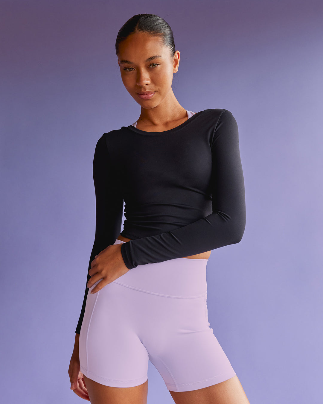 Woman wearing Effortless Long Sleeve Top - Black | Model:Tali | Size:S - view 2