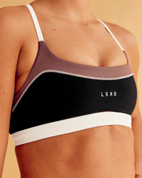Man wearing Elevate Sports Bra - Black-Multi | Model:Charlize | Size:S | Thumbnail Index: 0