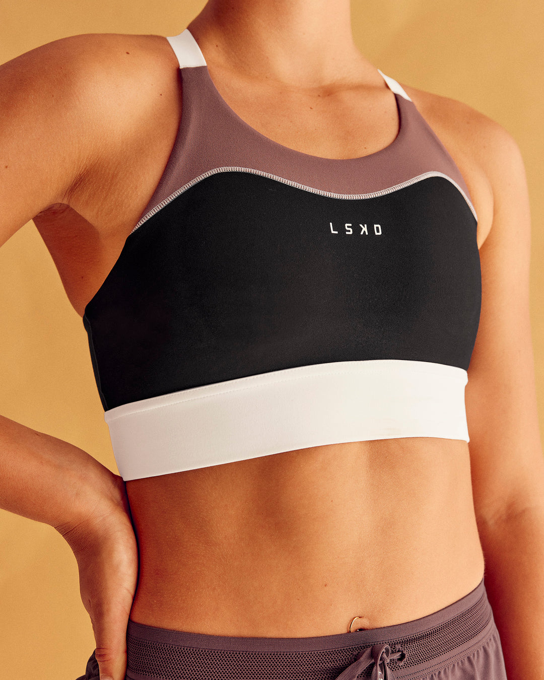 Woman wearing Elevated Accelerate Sports Bra - Black-Multi | Model:Charlize | Size:S - view 4