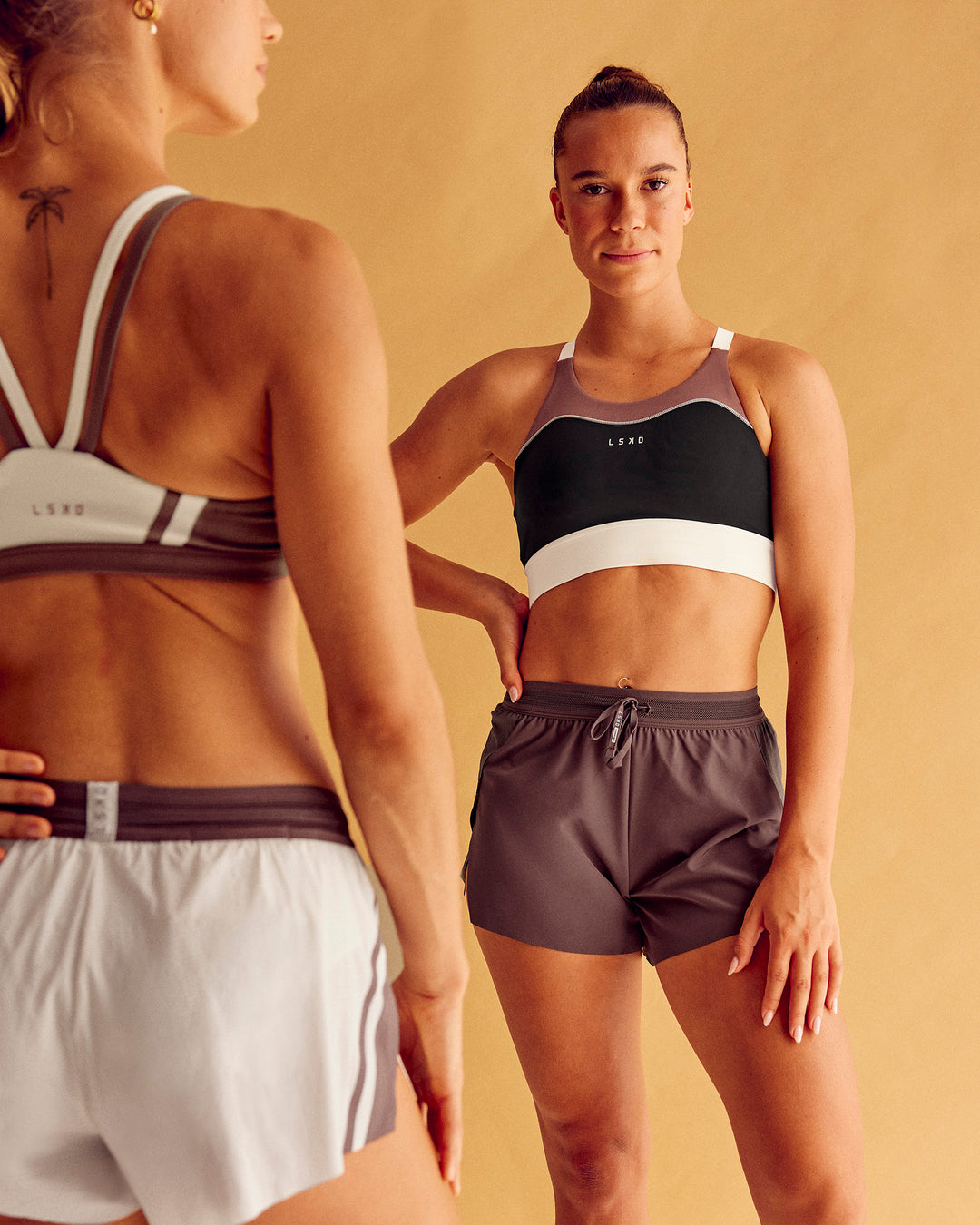 Woman wearing Elevated Accelerate Sports Bra - Black-Multi | Model:Charlize | Size:S - view 1