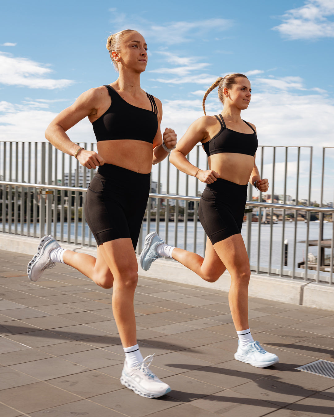 Duo wearing Elite Run High-Rise 7" Short Pockets - Black | Model:Both | Size:S - view 2
