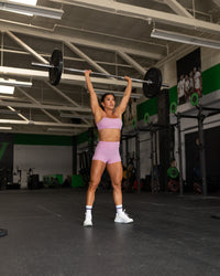Woman wearing Enhance Ultra High-Rise 4" Short - Pink Frosting | Model:Emily | Size:S | Thumbnail Index: 2