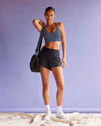Woman wearing Flash Longline Sports Bra - Night Shadow | Model:Tali | Size:S | Thumbnail Index: 2