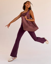 Woman wearing Fusion V-Contour High-Rise Flared Legging Pockets - Cherry Lacquer | Model:Jordan | Size:S | Thumbnail Index: 5