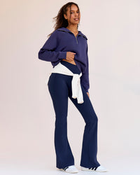 Woman wearing Fusion V-Contour High-Rise Flared Legging Pockets - Future Navy | Model:Jordan | Size:S | Thumbnail Index: 2
