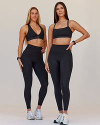 Woman wearing Fusion V-Contour Ultra High-Rise Full Length Legging Pockets - Black | Model:Both | Size:S | Thumbnail Index: 7