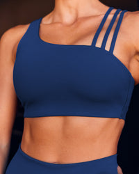Woman wearing Galvanise Sports Bra 2.0 - Midnight Blue | Model:Dani | Size:S | Thumbnail Index: 0