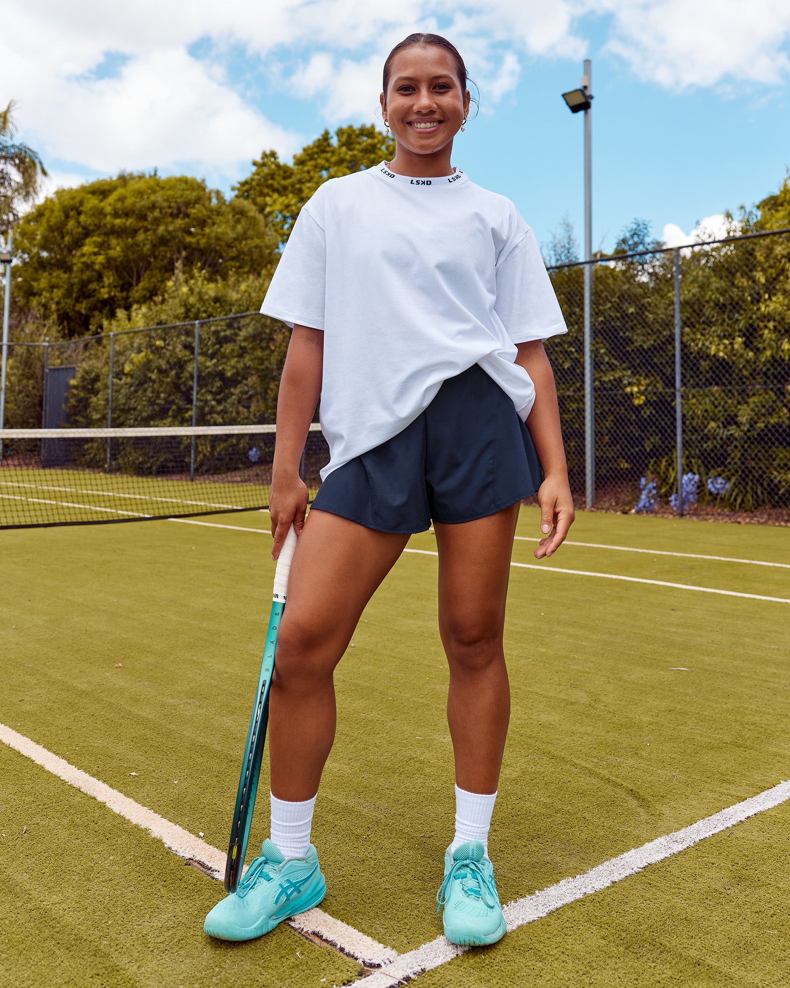 Woman wearing Go-To FLXCotton Oversized Deviation Tee - White-Future Navy | Model:Laquisa | Size:S