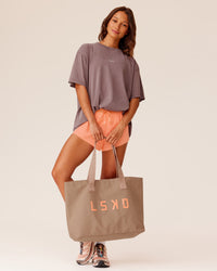 Woman wearing Go-To FLXCotton Oversized Tee - Peppercorn Washed | Model:Dakota | Size:S | Thumbnail Index: 0