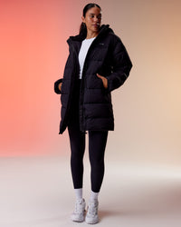 Woman wearing Go-To Puffer Long Jacket - Black | Model:Ella | Size:S | Thumbnail Index: 0