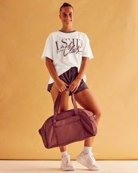 Woman wearing LSKD Fitness Club Heavyweight Oversized Tee - Off White-Cocoa Powder | Model:Charlize | Size:S | Thumbnail Index: 3