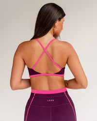 Woman wearing Liberate Sports Bra - Plum Caspia-Ultra Pink | Model:Jordi | Size:S | Thumbnail Index: 4