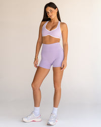 Woman wearing Luminous Sports Bra - Pale Lilac-White | Model:Jordi | Size:S | Thumbnail Index: 4
