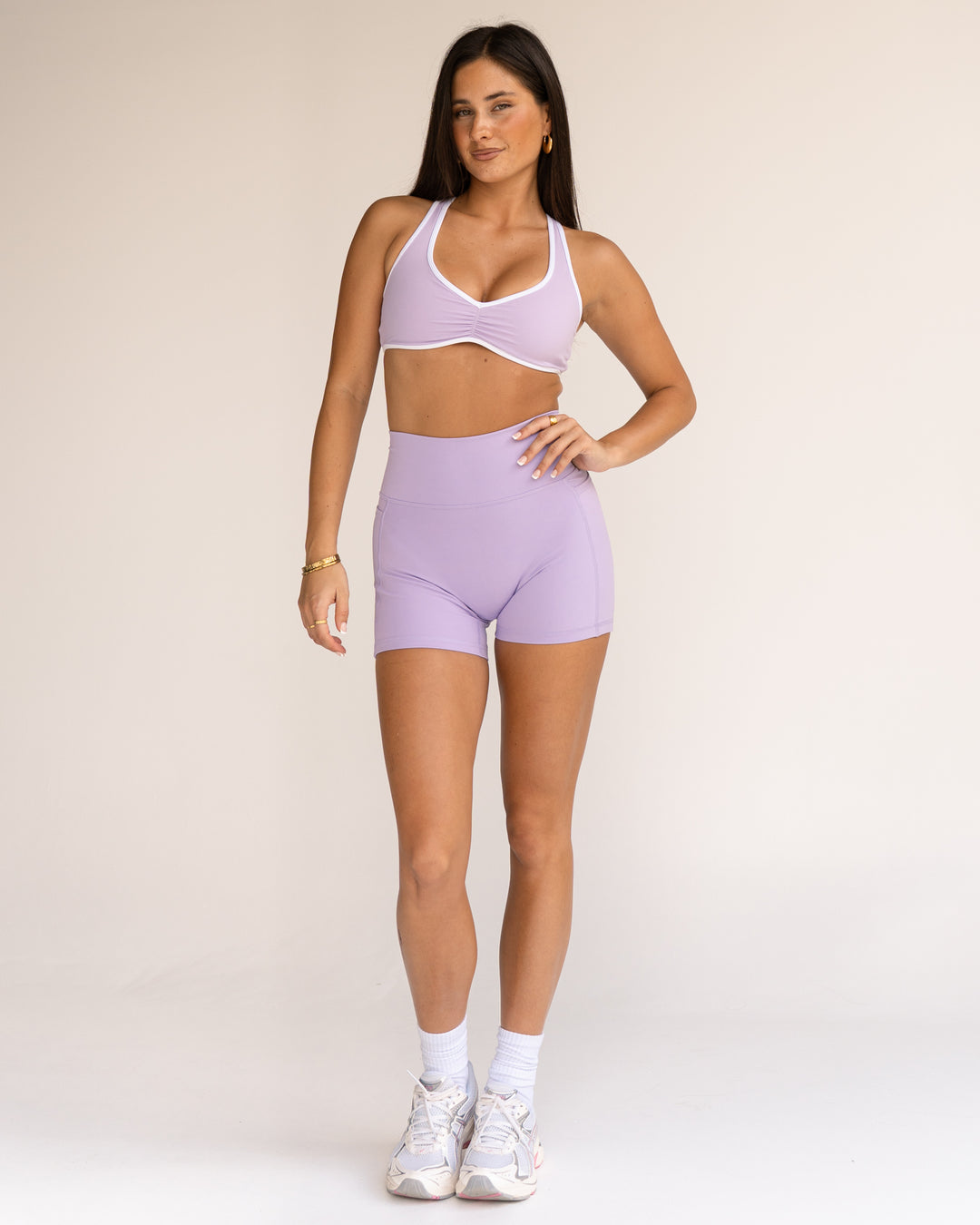 Woman wearing Luminous Sports Bra - Pale Lilac-White | Model:Jordi | Size:S - view 4