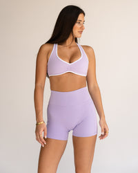 Woman wearing Luminous Sports Bra - Pale Lilac-White | Model:Jordi | Size:S | Thumbnail Index: 0