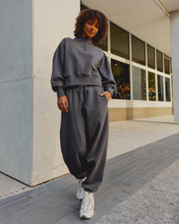 Woman wearing MVP Oversized Slouchy Fit Track Pant - Dark Storm | Model:Tomi | Size:S | Thumbnail Index: 1