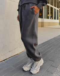 Woman wearing MVP Oversized Slouchy Fit Track Pant - Dark Storm | Model:Tomi | Size:S | Thumbnail Index: 2