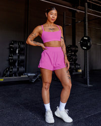 Woman wearing Momentum Sports Bra - Ultra Fuchsia | Model:Beccie | Size:S | Thumbnail Index: 4