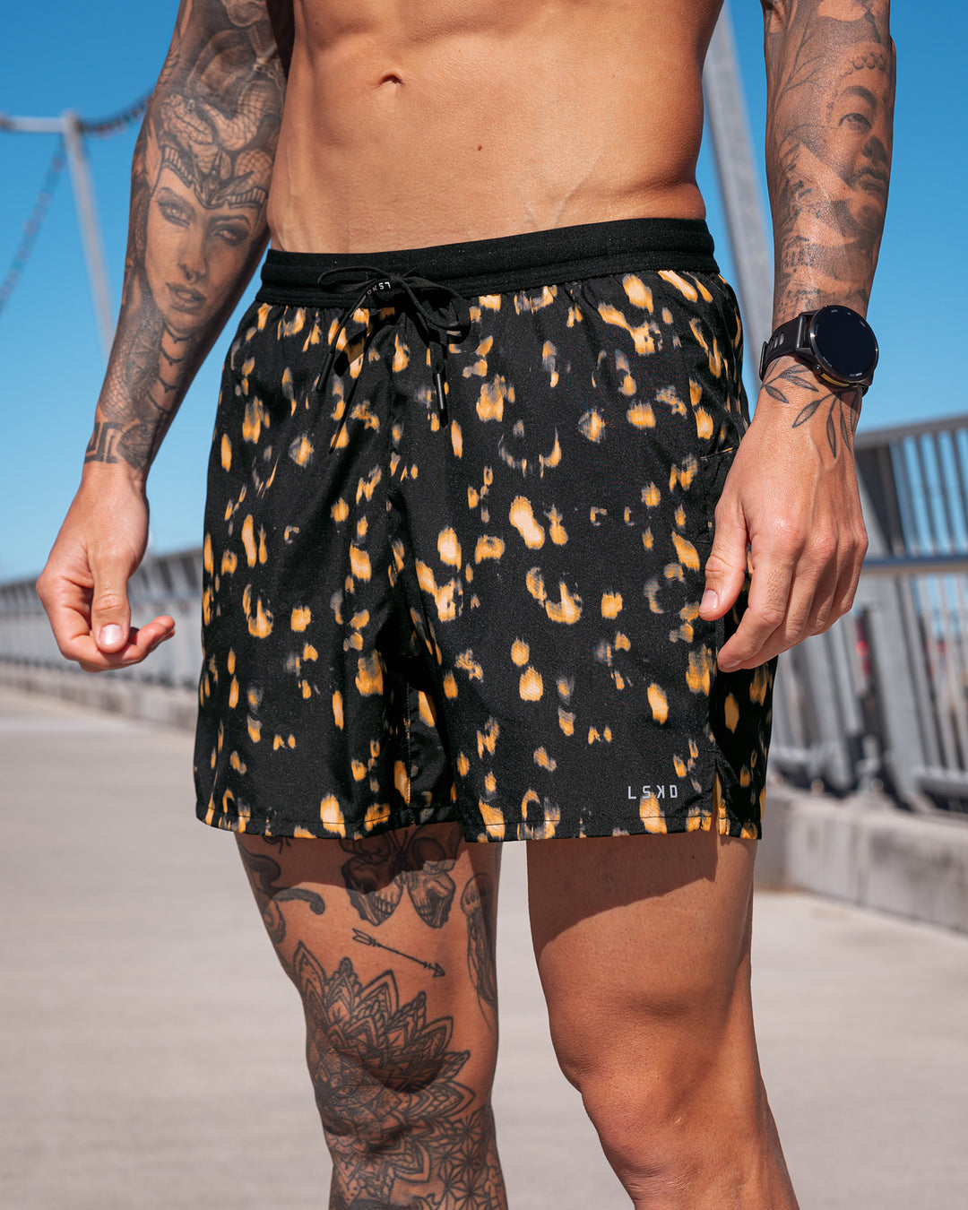 Man wearing Pace 5" Lined Running Short - Markings Black Print | Model:Tommy | Size:S - view 1