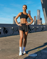 Woman wearing Pacer 3" Run Short - Black | Model:Nina | Size:S | Thumbnail Index: 4