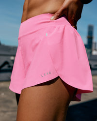 Woman wearing Pacer 3" Run Short - Candy Pink | Model:Mikeala | Size:S | Thumbnail Index: 0