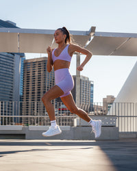 Woman wearing Reform Sports Bra - Violet Ray | Size:S | Thumbnail Index: 2