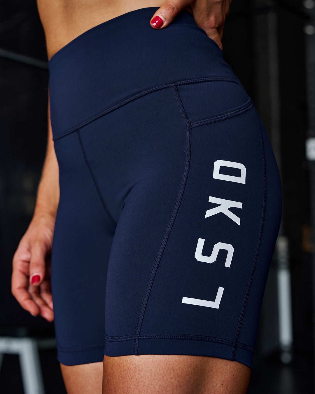 Woman wearing Rep Ultra High-Rise 6" Short Pockets - Future Navy-White | Model:Ella | Size:S - view 2