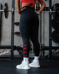Woman wearing Rep Ultra High-Rise Full Length Legging Pockets - Black-Scarlet | Model:Lyss | Size:S | Thumbnail Index: 0