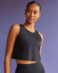 Woman wearing Restore CloudFLX Tank - Black | Model:Tali | Size:S | Thumbnail Index: 3