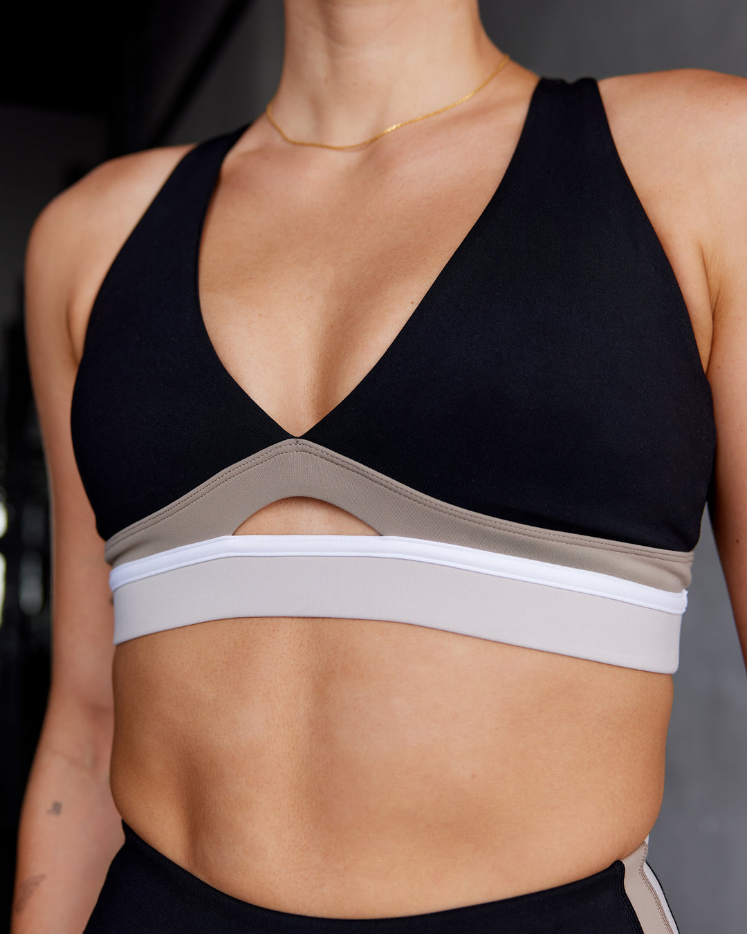 Woman wearing Revitalise Sports Bra - Black-Multi | Model:Shae | Size:S - view 3