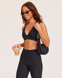 Woman wearing Stamina Sports Bra - Black | Model:Dakota | Size:S | Thumbnail Index: 0