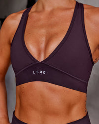 Woman wearing Stamina Sports Bra - Midnight Plum | Model:Roisin | Size:S | Thumbnail Index: 4