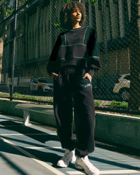 Woman wearing Stitch Up Fleece Sweat Pant - Black/Dark Moss | Model:Tomi | Size:S | Thumbnail Index: 3