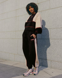 Woman wearing Stitch Up Fleece Sweat Pant - Black/Shale Beige | Model:Tomi | Size:S | Thumbnail Index: 1