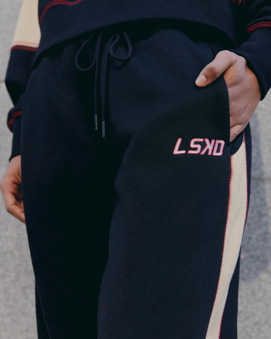 Woman wearing Stitch Up Fleece Sweat Pant - Black/Shale Beige | Model:Tomi | Size:S - view 3