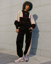 Woman wearing Stitch Up Oversized Fleece Sweater - Black-Shale Beige | Model:Tomi | Size:S | Thumbnail Index: 3