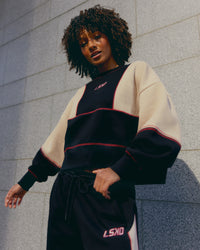 Woman wearing Stitch Up Oversized Fleece Sweater - Black-Shale Beige | Model:Tomi | Size:S | Thumbnail Index: 4