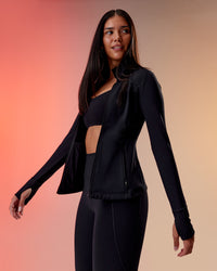 Woman wearing Stride Thermal Zip Through Jacket - Black | Model:Rhiley | Size:S | Thumbnail Index: 3