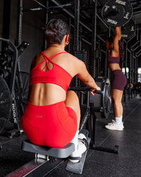 Woman wearing Strive Jacquard Sports Bra - Flame | Model:Iris | Size:S | Thumbnail Index: 3